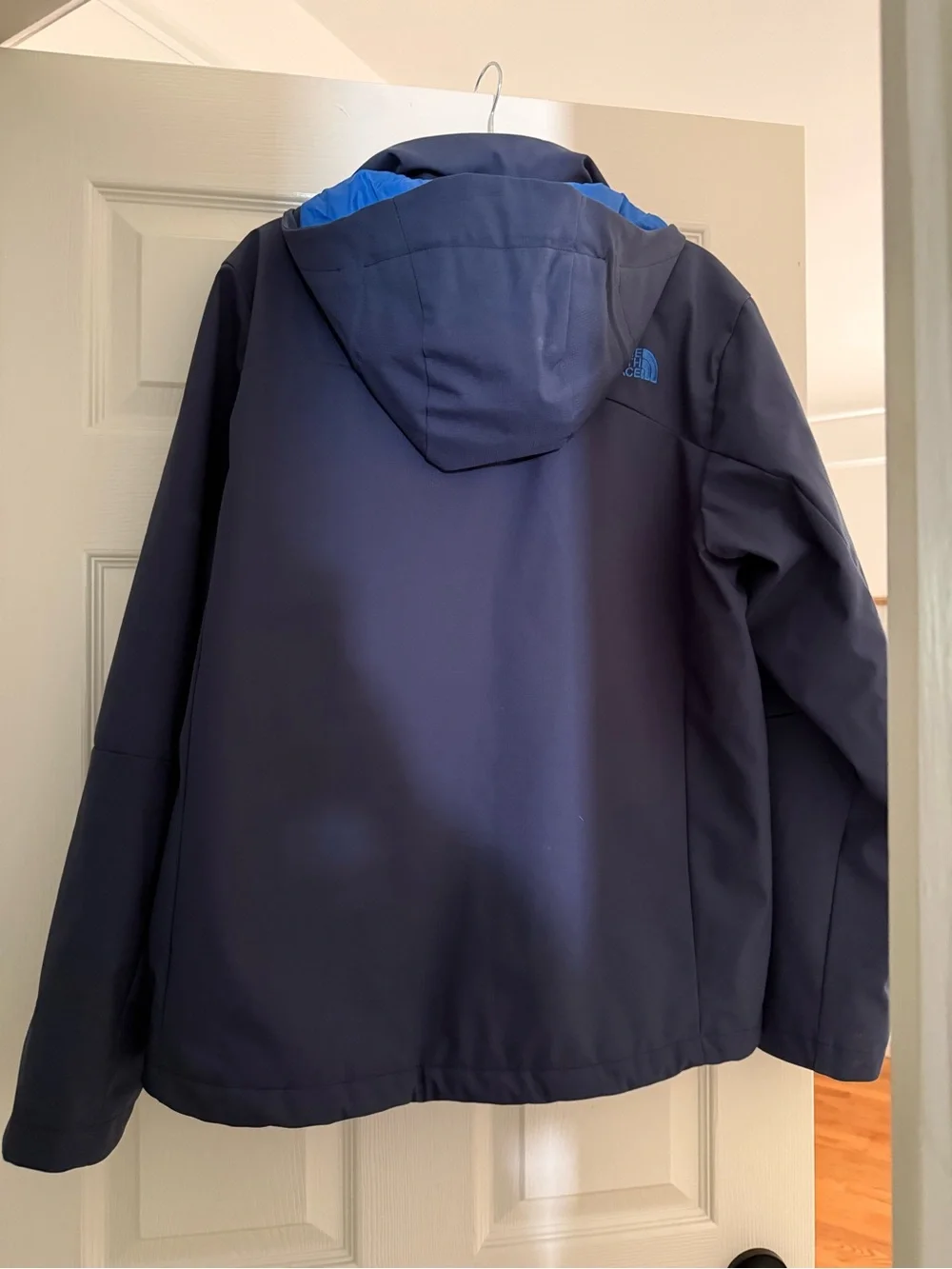 The North Face Navy Jacket with Bright Blue Lining